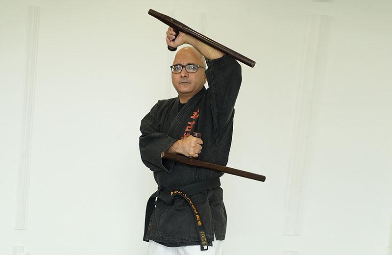 //zendankaimartialarts.com/wp-content/uploads/2023/10/Okinawan-Kobudo-1.jpg